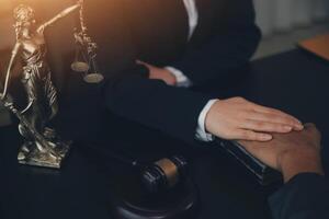 Law theme, gavel or mallet of the judge, lawyer enforcement officers, evidence-based cases taken into account in the court abount business, legislation. photo