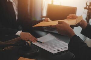 Law theme, gavel or mallet of the judge, lawyer enforcement officers, evidence-based cases taken into account in the court abount business, legislation. photo