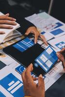 The designer team is designing the uxui system to make the uxui system work well on new phones and support system updates. Website development concept UI UX front end designer photo