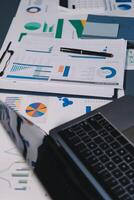 Team of business people are meeting to analyze data for marketing plan,Market research reports and income statistics, Financial and Accounting concept. photo