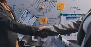 Business handshake for teamwork of business merger and acquisition,successful negotiate,hand shake,two businessman shake hand with partner to celebration partnership and business deal concept photo