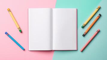 Blank white book and pencils coloring decoration for drawing or texting and pastel background photo