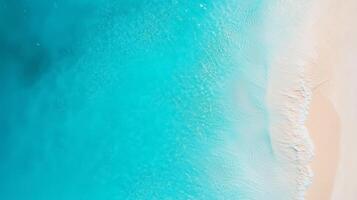 Blue marine water smooth wave with pink sand beach aerial view photo