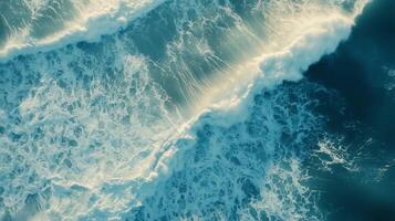 Aerial view of ocean smooth wave on beach, blue water for holiday trip photo