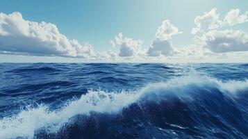 Ocean wave blue surface with blue sky and clouds photo