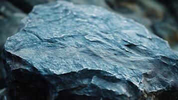 Grey stone chunk igneous rock on river dried photo