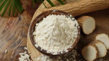 Cassava root flour gluten free on wooden bowl for healthy bread photo