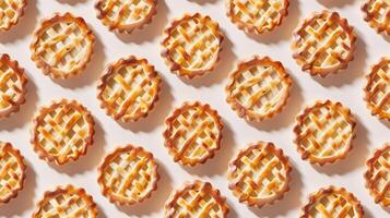 Pie tartlet pattern seamless diagonal on pink background photo