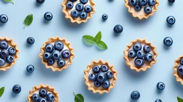 Blueberry pie tart pattern seamless with fruit decoration on blue background photo