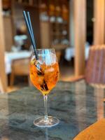 Aperol Spritz - A refreshing Italian cocktail combining Aperol, Prosecco, and a splash of soda, garnished with an orange slice, perfect for warm days and casual gatherings photo
