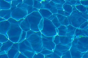 The reflection of the suns rays in the water in the pool with sea water, The glare of the sun, Egypt photo
