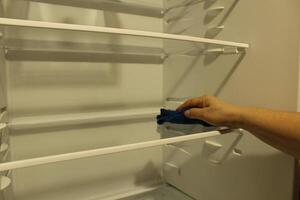 Cleaning cleaning fridge sink wipes the shelf inserts the shelf photo