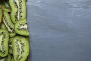 Kiwi Slices Background with free space for the text of the product photo. Concept of Consumption of Local Seasonal Kiwi Fruit Products photo