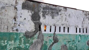 A building that is smoking because it is on fire photo