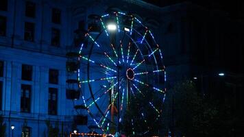 The Chistmas night city view with the lights on at night photo
