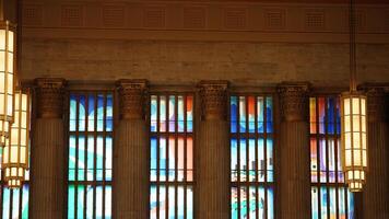 The Philadelphia train station internal view with the colorful glass windows in it photo