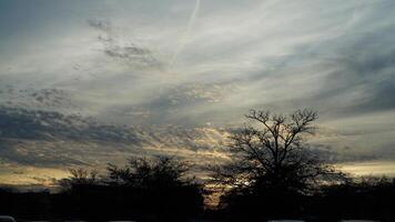 The beautiful sunset sky view with the colorful clouds as background photo