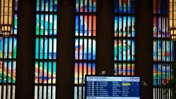 The Philadelphia train station internal view with the colorful glass windows in it photo