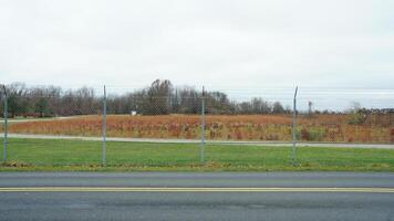 The usa countryside view surrounded by the colorful forest woods in autumn photo