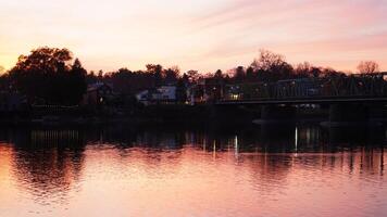 The beautiful sunset view with the colorful sky and river as background in a little USA town photo