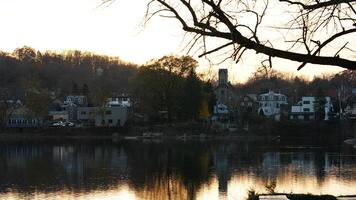 The beautiful sunset view with the colorful sky and river as background in a little USA town photo