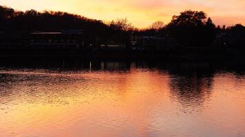 The beautiful sunset view with the colorful sky and river as background in a little USA town photo