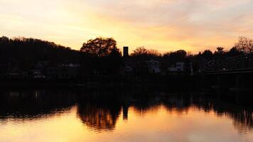 The beautiful sunset view with the colorful sky and river as background in a little USA town photo