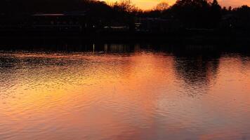 The beautiful sunset view with the colorful sky and river as background in a little USA town photo