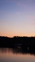 The beautiful sunset view with the colorful sky and river as background in a little USA town photo