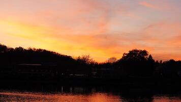 The beautiful sunset view with the colorful sky and river as background in a little USA town photo