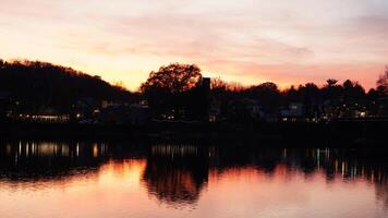 The beautiful sunset view with the colorful sky and river as background in a little USA town photo