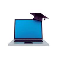 a laptop computer with a graduation cap on top photo