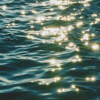 sun shining on water surface photo
