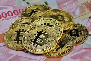 Bitcoin and indonesia money rupiah image stock photo