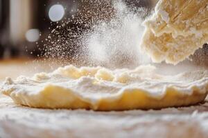 Dough Being Dusted with Flour During Baking photo