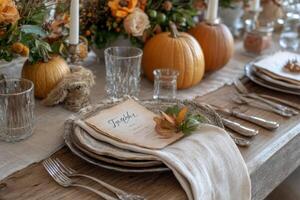 Rustic Autumnal Table Setting with Pumpkins and Menu Card photo