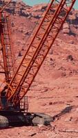 A large crane sitting in the middle of a desert video