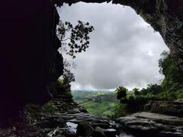 A view of a cave from inside photo