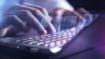 A laptop screen shows a close-up of hands working with artificial intelligence. video