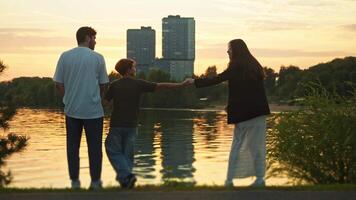 Two separating parents are in conflict over their son. They are pulling him in opposite directions, forcing him to make a difficult decision. video