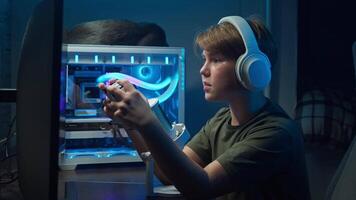 A teenage boy is playing on his gaming PC using a gamepad, he gets upset because his team lost in an online tournament. Slow motion video
