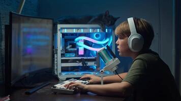 Teenage boy, while playing a game and communicating with other players via voice chat, becomes frustrated and angry after his team's defeat in the game. video