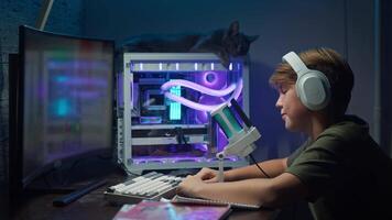 Teenage boy was disappointed with the outcome of the match in online shooters, which he played on his computer while at home in the evening. Slow motion video