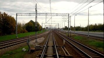 A close-up of the tracks captured while the train is in motion creates a dynamic sense of speed and travel. This shot conveys the energy of the journey and opens up new horizons. video