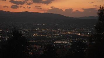 The view from the observation deck in Tbilisi, Georgia, at night, with its many illuminated buildings. video