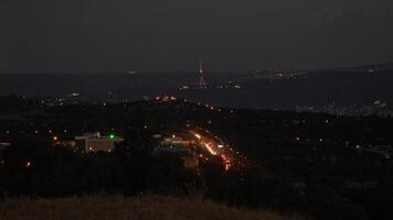 Night view of the residential area of the ancient Georgian city of Tbilisi, which is located in the mountains, is presented. video