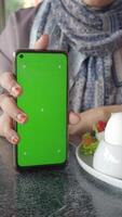 Green Screen Smartphone in a Caf Setting video