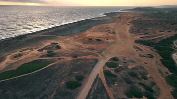 Aerial view around the western tip of the Caribbean island of Aruba video