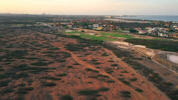 Aerial view around the western tip of the Caribbean island of Aruba video