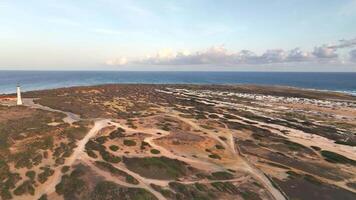 Aerial view around the western tip of the Caribbean island of Aruba video